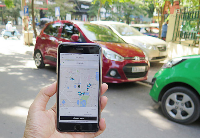 ha-noi-chinh-thuc-tram-dich-vu-di-chung-xe-cua-grab-va-uber
