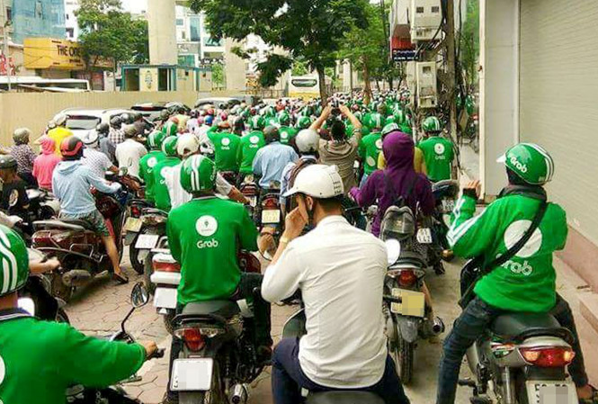 tai-xe-grabbike-dinh-cong-dai-dien-grab-viet-nam-len-tieng