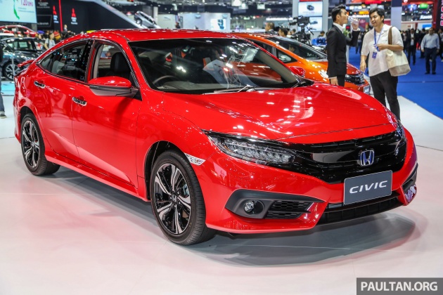honda-trinh-lang-chiec-civic-hatchback-mau-do-ruc-dep-long-lanh