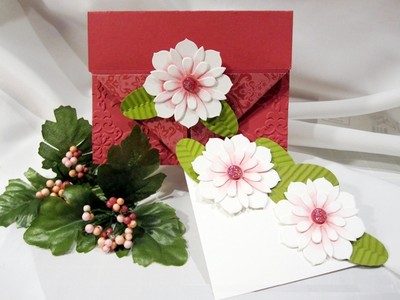 Cuối c&ugrave;ng, d&aacute;n 2 b&ocirc;ng hoa tr&ecirc;n tấm giấy trắng v&agrave; 1 hoa l&ecirc;n giữa hai m&eacute;p gấp tam gi&aacute;c của tấm thiệp đỏ l&agrave; ho&agrave;n th&agrave;nh. Viết lời ch&uacute;c l&ecirc;n tấm thiệp trắng v&agrave; đặt trong tấm thiệp đỏ. N&ecirc;n l&agrave;m th&ecirc;m chiếc phong b&igrave; để đặt tấm thiệp b&ecirc;n trong. Tấm thiệp hoa xinh y&ecirc;u tự tay bạn l&agrave;m sẽ l&agrave; m&oacute;n qu&agrave; &yacute; nghĩa d&agrave;nh tặng thầy c&ocirc; nh&acirc;n ng&agrave;y 20/11 sắp tới.