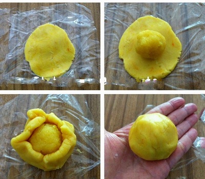 Cho nh&acirc;n custard v&agrave;o giữa, bọc đều c&aacute;c m&eacute;p xung quanh v&agrave; vi&ecirc;n tr&ograve;n k&iacute;n