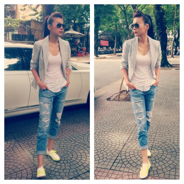 Thanh Hằng diện quần jeans xắn gấu cao năng động v&agrave; c&aacute; t&iacute;nh