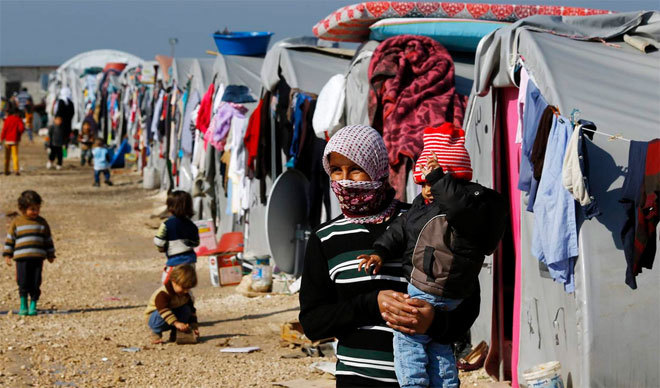 Người tị nạn trở về Kobani sau khi khủng bố IS r&uacute;t lui