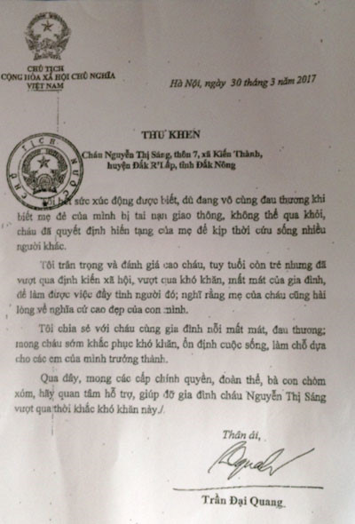 Thư của chủ tịch nước gửi em Nguyễn Thị S&aacute;ng. Ảnh: VOV