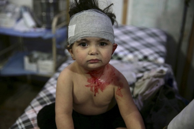 8,4 triệu trẻ em, tức hơn 80% trẻ em Syria bị ảnh hưởng bởi chiến tranh, theo Quỹ Nhi đồng Liên Hiệp Quốc (UNICEF). Ảnh: Reuters