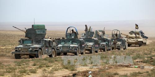  Chiến sự Syria h&ocirc;m nay đề cập đến vấn đề Iraq cắt c&aacute;c tuyến tiếp viện IS từ Mosul tới Syria. Ảnh: AFP/TTXVN