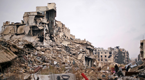  Chiến sự Syria: Cảnh hoang t&agrave;n ở khu vực ch&iacute;nh phủ Syria kiểm so&aacute;t tại th&agrave;nh phố chiến sự Aleppo ng&agrave;y 17/12. Ảnh: Reuters