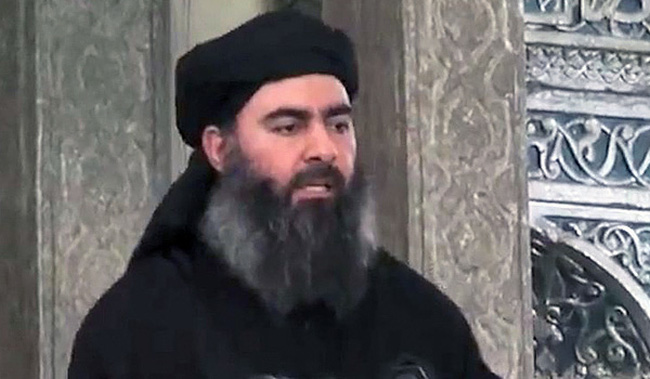 Tr&ugrave;m khủng bố IS Abu Bakr Al-Baghdadi. Ảnh: AP