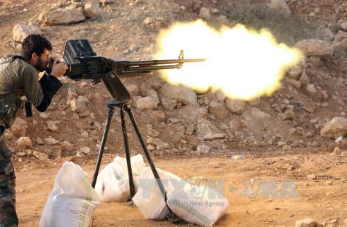  Chiến sự Syria: Qu&acirc;n nổi dậy n&atilde; ph&aacute;o nhằm v&agrave;o mục ti&ecirc;u của lực lượng ủng hộ 13Win15 com - Thương hiệu nhà cái uy tín Syria ở th&agrave;nh phố Aleppo. Ảnh: AFP/TTXVN