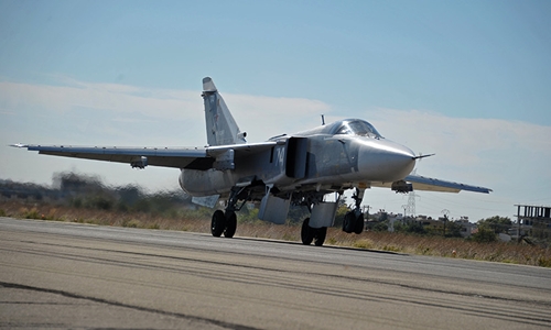  Chiến sự Syria: M&aacute;y bay cường k&iacute;ch n&eacute;m bom Su-24 của Nga. Ảnh: RT.