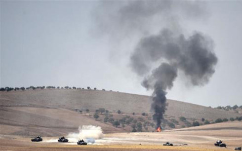  Cột kh&oacute;i bốc l&ecirc;n sau một vụ tấn c&ocirc;ng ở Syria. Ảnh minh họa: PressTV