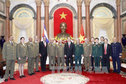 Chủ tịch nước Trần Đại Quang v&agrave; đo&agrave;n đại biểu cấp cao Bộ c&aacute;c Lực lượng vũ trang c&aacute;ch mạng Cuba do đồng ch&iacute; Thượng tướng Leopoldo Cintra Fr&iacute;as, Ủy vi&ecirc;n Bộ Ch&iacute;nh trị, Bộ trưởng dẫn đầu sang thăm hữu nghị ch&iacute;nh thức Việt Nam. Ảnh: TTXVN