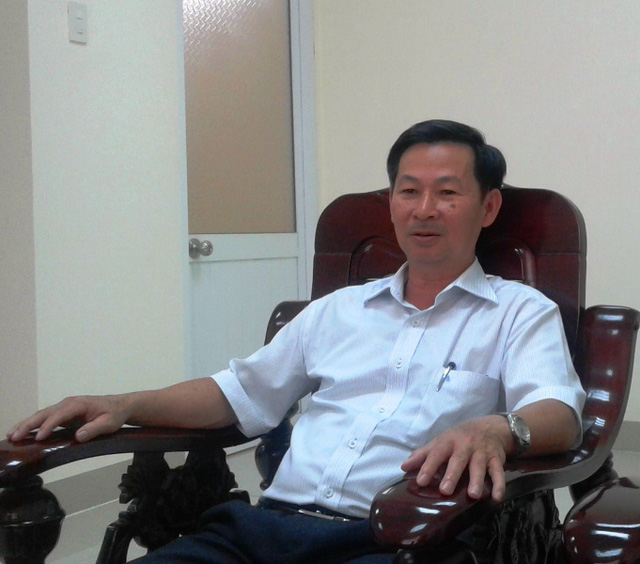  &Ocirc;ng Đặng Trung Th&agrave;nh - Gi&aacute;m đốc Sở T&agrave;i nguy&ecirc;n v&agrave; 13Win1 tải ứng dụng B&igrave;nh Định. Ảnh: Vietnamnet