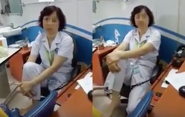  TS.BS Nguyễn Thị M. bị hạ bậc thi đua 1 th&aacute;ng v&igrave; g&aacute;c ch&acirc;n l&ecirc;n ghế. Ảnh: VietNamNet