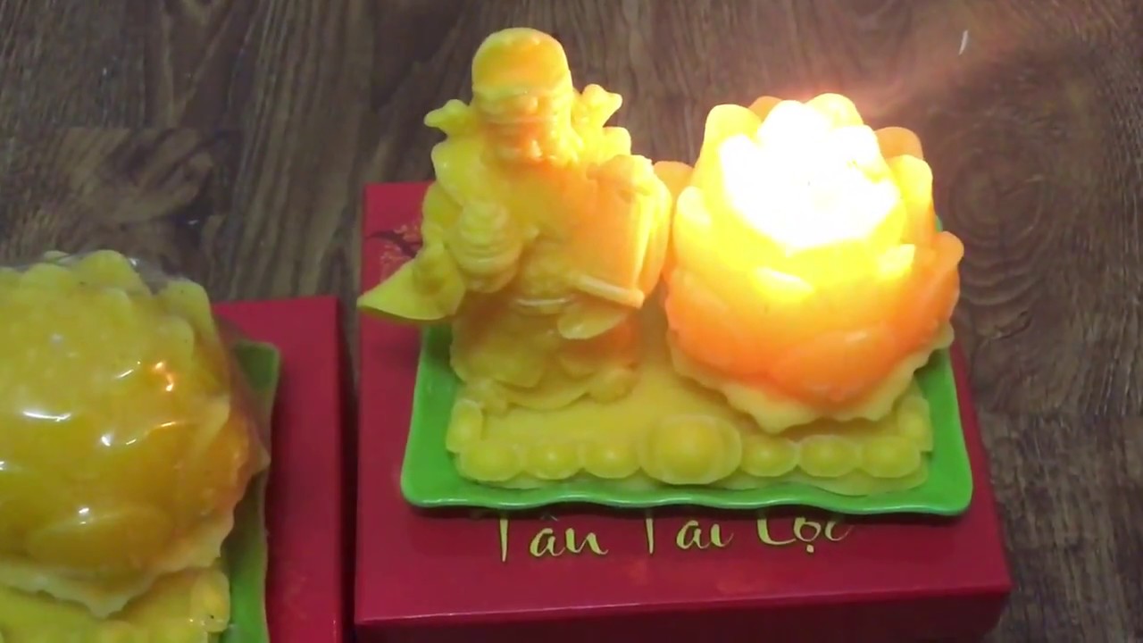 Nến h&igrave;nh thần t&agrave;i, hoa sen