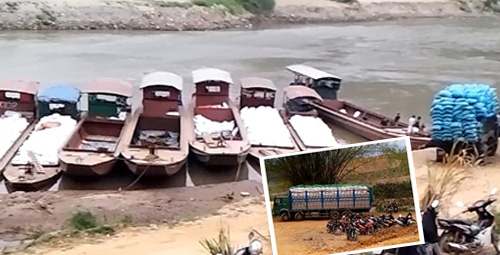 Đầu nậu đợi h&agrave;ng để vận chuyển tới chợ v&agrave; về c&aacute;c kho