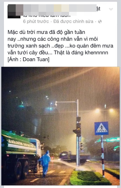 Bức ảnh &lsquo;C&ocirc;ng nh&acirc;n tưới c&acirc;y giữa đ&ecirc;m mưa tầm t&atilde; ở H&agrave; Nội&rsquo; thu h&uacute;t sự ch&uacute; &yacute; của cộng động mạng x&atilde; hội