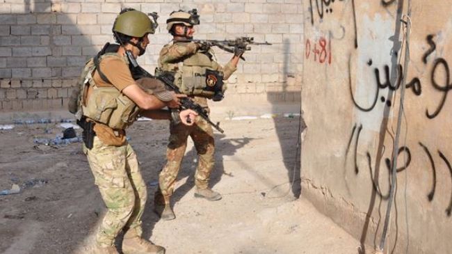 C&aacute;c binh sỹ Iraq trong một trận chiến với khủng bố IS