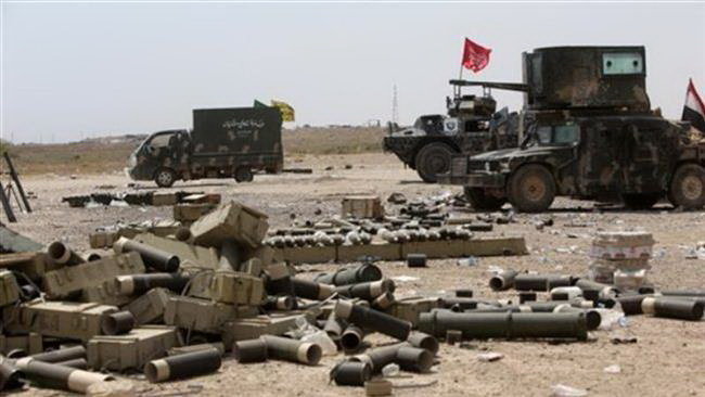 Lực lượng d&acirc;n qu&acirc;n t&igrave;nh nguyện Iraq đ&oacute;ng ở gần th&agrave;nh phố Fallujah