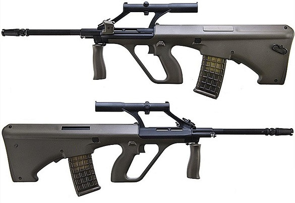 S&uacute;ng AUG c&oacute; thiết kế bullpup với v&agrave;nh bao quanh c&ograve; rất lớn, gi&uacute;p xạ thủ c&oacute; thể sử dụng dễ d&agrave;ng kể cả khi đeo găng tay. Ảnh: LĐ 