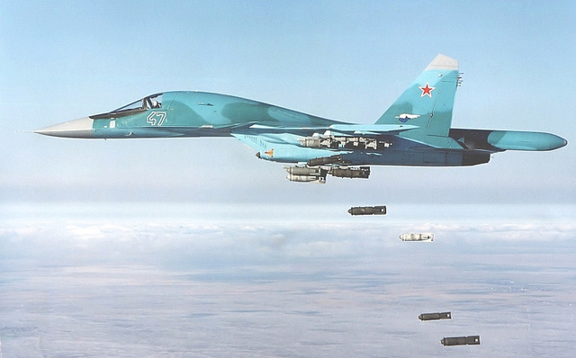 M&aacute;y bay n&eacute;m bom Tu-95MS của Nga c&oacute; khả năng mang 15 tấn bom đạn. Ảnh: Infonet 