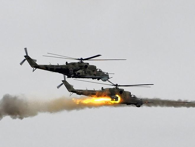 Trực thăng Mi-35M l&agrave; vũ kh&iacute; được Nga tiếp tục điều tới Syria mặc d&ugrave; mới được bi&ecirc;n chế. Ảnh: ANTĐ