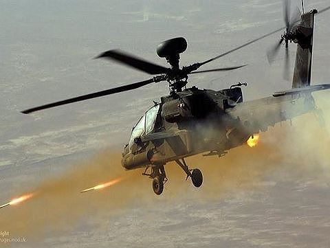 Trực thăng tấn c&ocirc;ng AH-64 Apache l&agrave; vũ kh&iacute; bảo vệ Tổng Thống Mỹ tại cuộc gặp thượng đỉnh Mỹ- Triều Ti&ecirc;n. Ảnh: ANTĐ
