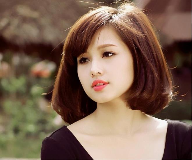 Kiểu t&oacute;c ngang cằm mang lại vẻ sang trọng qu&yacute; ph&aacute;i cho c&ocirc; n&agrave;ng mặt tr&ograve;n 