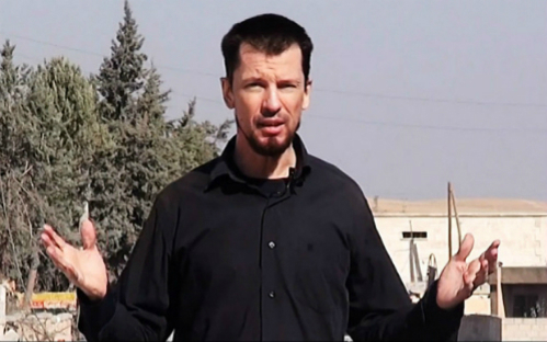 Nh&agrave; nước Hồi gi&aacute;o IS tung video mới của ph&oacute;ng vi&ecirc;n người Anh John Cantlie tuy&ecirc;n bố gi&agrave;nh chiến thắng tại thị trấn Kobane, dựng l&ecirc;n vở kịch truyền th&ocirc;ng. Ảnh Telegraph