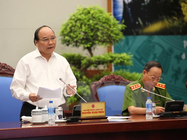 Ph&oacute; Thủ tướng Nguyễn Xu&acirc;n Ph&uacute;c, Trưởng Ban Chỉ đạo 138/CP ph&aacute;t biểu tại hội nghị. (Ảnh: Do&atilde;n Tấn/TTXVN)