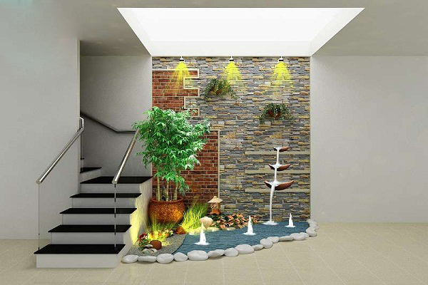 Phần lớn gầm cầu thang của nh&agrave; tầng b&agrave;i tr&iacute; tiểu cảnh kh&ocirc; sẽ đ&uacute;ng nguy&ecirc;n tắc phong thủy