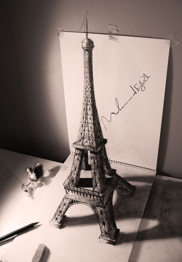 Tháp Eiffel tí hon như thể hiện ra từ trước mắt.