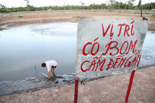 ben-tre-ca-nha-hoang-mang-song-cung-qua-bom-nang-300kg-duoi-day-ao