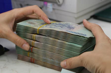 Nhiều người trong hội đồng quản trị ng&acirc;n h&agrave;ng nhận lương bạc tỷ mỗi năm. Ảnh: Vnexpress