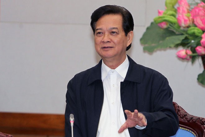 Thủ tướng Nguyễn Tấn Dũng dự Hội nghị trực tuyến với c&aacute;c địa phương tổng kết năm 2014 v&agrave; triển khai kế hoạch năm 2015. Ảnh: Laodong