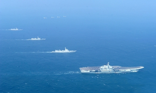 T&agrave;u s&acirc;n bay Li&ecirc;u Ninh của Trung Quốc trở về cảng Thanh Đảo, tỉnh Sơn Đ&ocirc;ng, sau một th&aacute;ng thử nghiệm ở Biển Đ&ocirc;ng