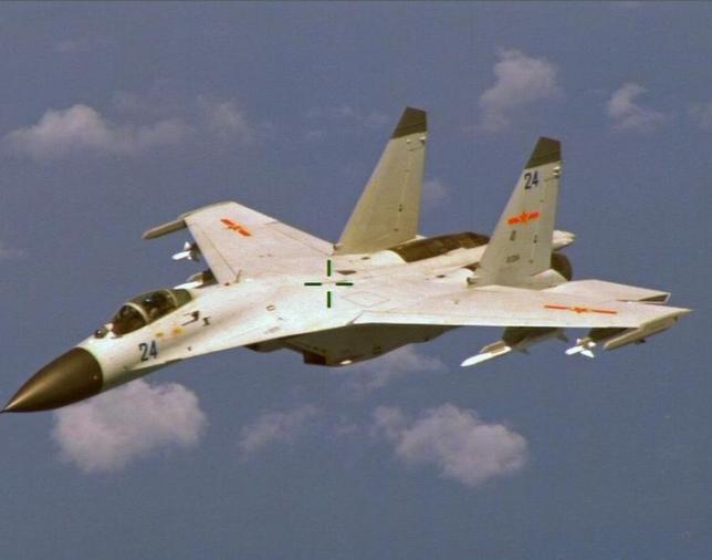 Chiến đấu cơ J-11 của Trung Quốc từng áp sát máy bay P-8 Poisedon của Mỹ ở Biển Đông tháng 8/2014 Chiến đấu cơ J-11 của Trung Quốc từng áp sát máy bay P-8 Poisedon của Mỹ ở Biển Đông tháng 8/2014