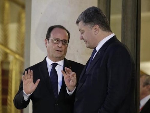 Tổng thống Ph&aacute;p Francois Hollande v&agrave; Tổng thống Ukraine Petro Poroshenko