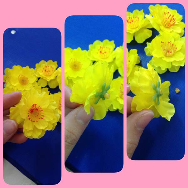 L&agrave;m cầu hoa trang tr&iacute; nh&agrave; đ&oacute;n Tết cần một ch&uacute;t tỉ mỉ ở bước gắn hoa 