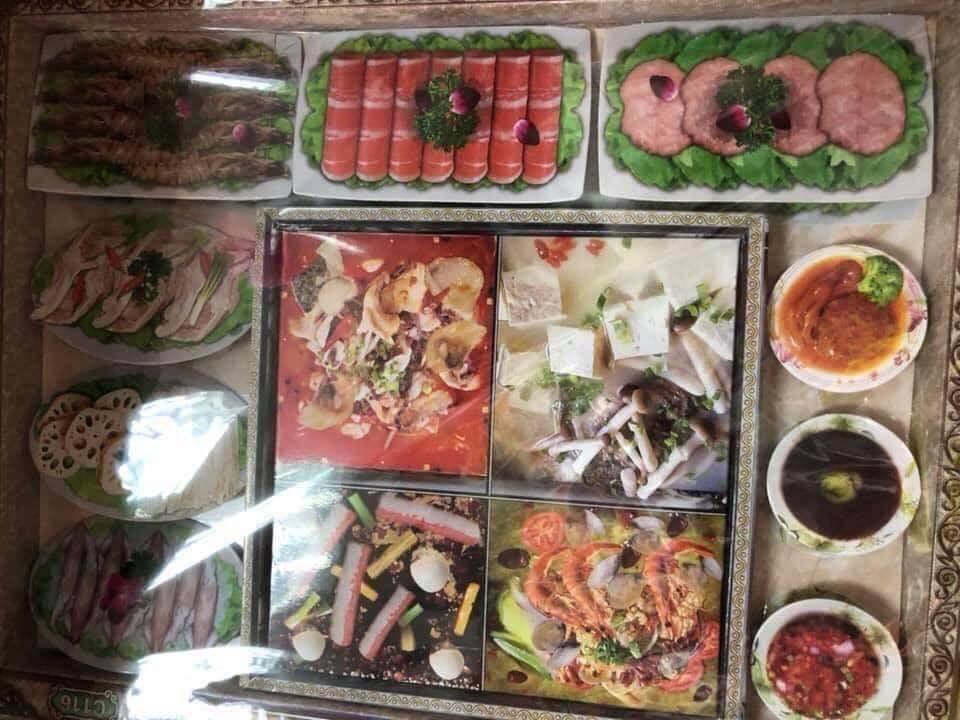 Thị trường v&agrave;ng m&atilde; c&uacute;ng 'c&ocirc; hồn': 'Set' lẩu, tr&agrave; sữa, lợn quay bằng v&agrave;ng m&atilde; được rao b&aacute;n