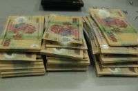 Người Trung Quốc tuồn tiền giả vào Việt Nam