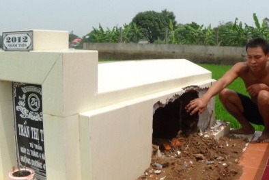 Phẫn nộ chồng đập mộ, vứt hài cốt của vợ xuống sông vì sợ bị ma ám