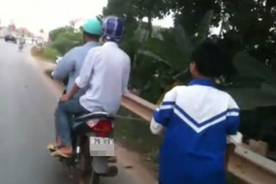 Trừng phạt tội nghiện game, bố xích con dắt sau xe máy
