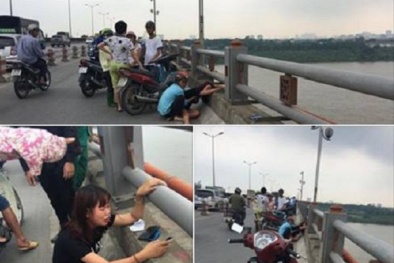 Người vợ trẻ khóc ngất chứng kiến cảnh chồng nhảy cầu tự tử